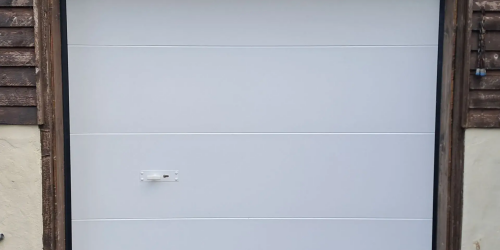 Pose d'une porte de garage sectionnelle